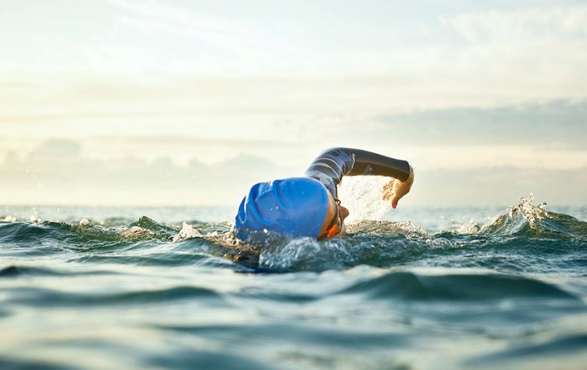 A man swimming to build cardiovascular strength